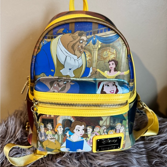 Loungefly Handbags - NWT -Loungefly Disney Beauty and the Beast Backpack